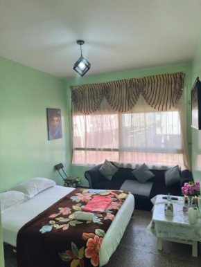 Chambre privée en plein centre